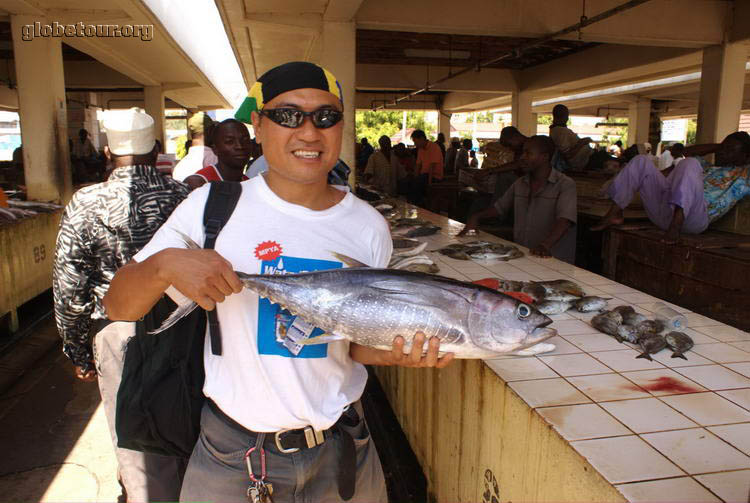 Tanzania, Dar Es Salam, Paul in fish market