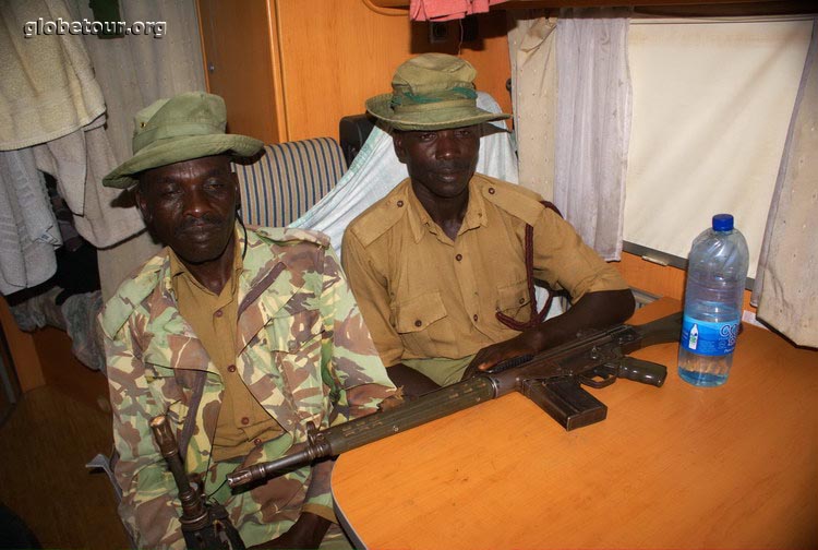 Kenya, Road to Moyale, soldiers in our car