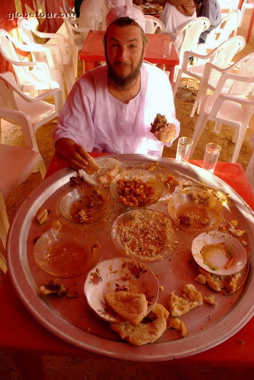 Sudan, Khartum, born celebration, Michael finishing all food.