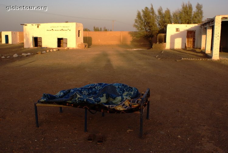 Pakistan. Nokkundi, customs oficer sleeping