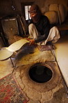 Pakistan,+Quetta,+making+bread