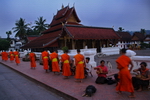 Laos,+Chiang+Mai,+monks+taking+food+in+the+morning